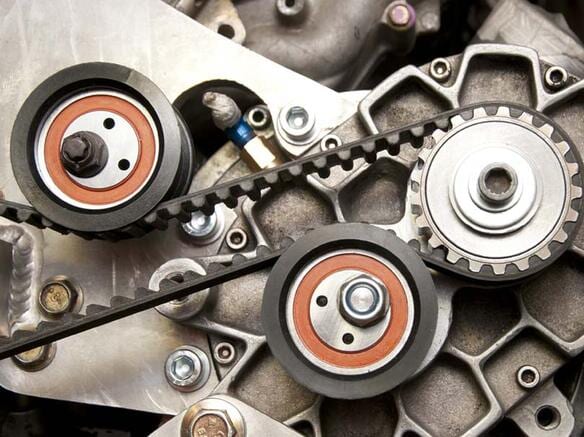 Engine drive belt and pulleys